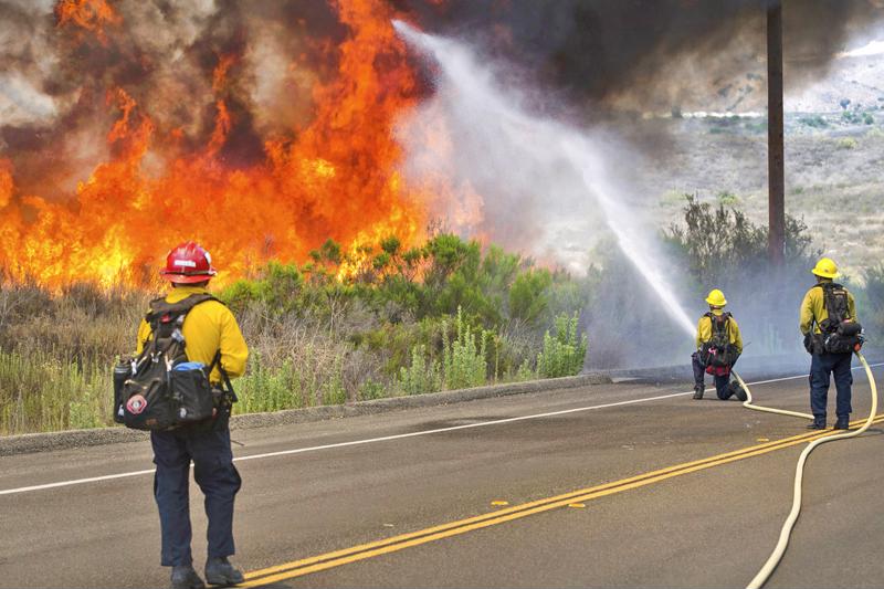 From rescuing others while their own homes burned to serving during the holidays, first responders proved their heroism in a trial by fire.