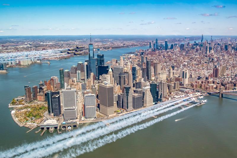 The Blue Angels and Thunderbirds have joined together in a rare collaborative salute over numerous American cities.