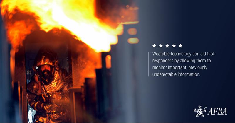 An image of a firefighter with text that reads, " Wearable technology can aid first responders by allowing them to monitor important, previously undetectable information."